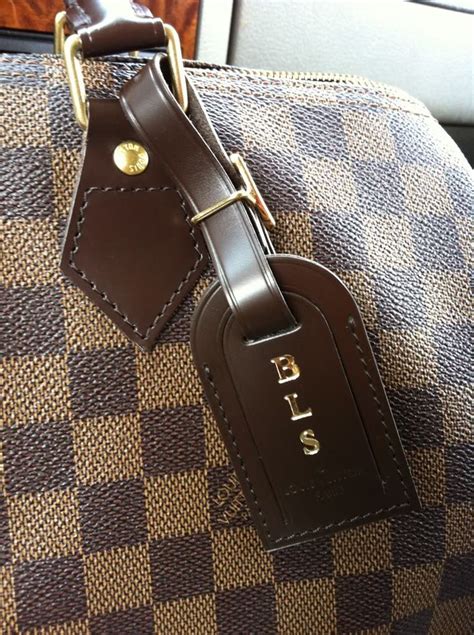 louis vuitton luggage tag ebene